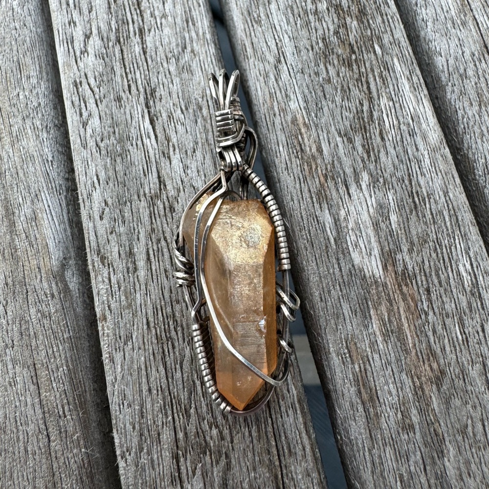 Sterling silver wire wrapped crystal with large bail.